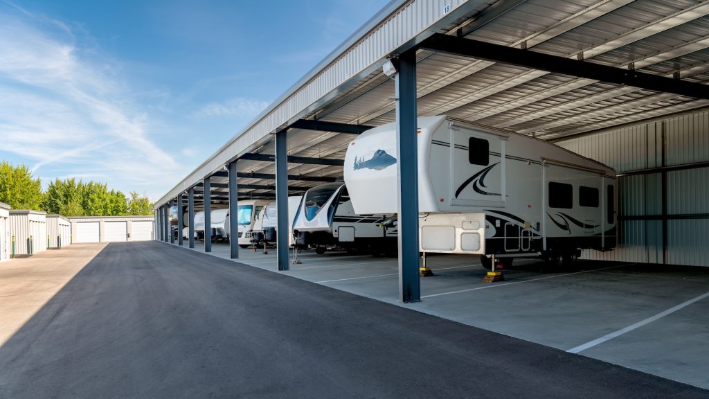 a covered parking lot for storing RVs is a great place to properly store your RV in the off season